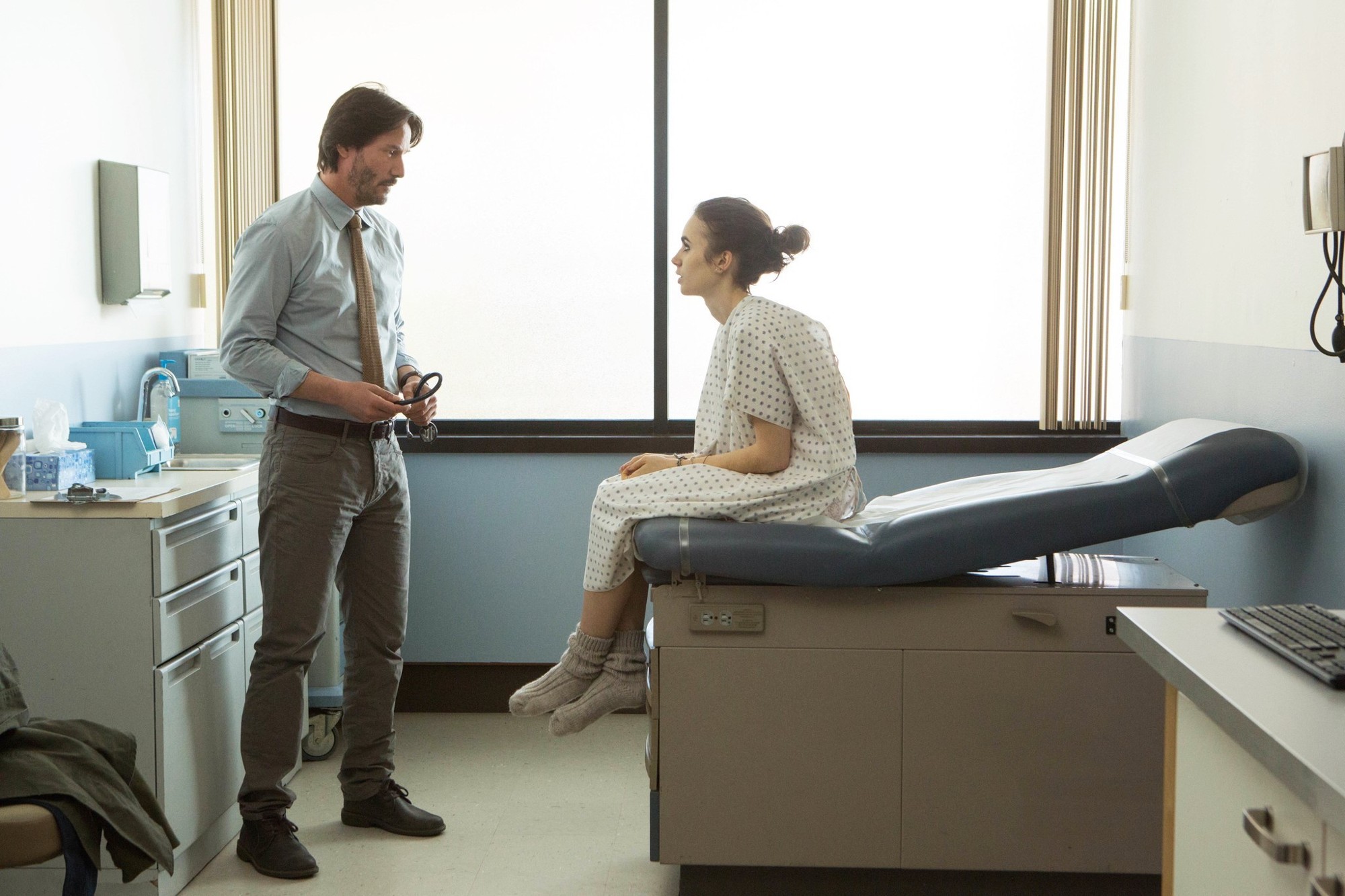 Keanu Reeves stars as Dr. William Beckham and Lily Collins stars as Ellen in Netflix's To the Bone (2017)