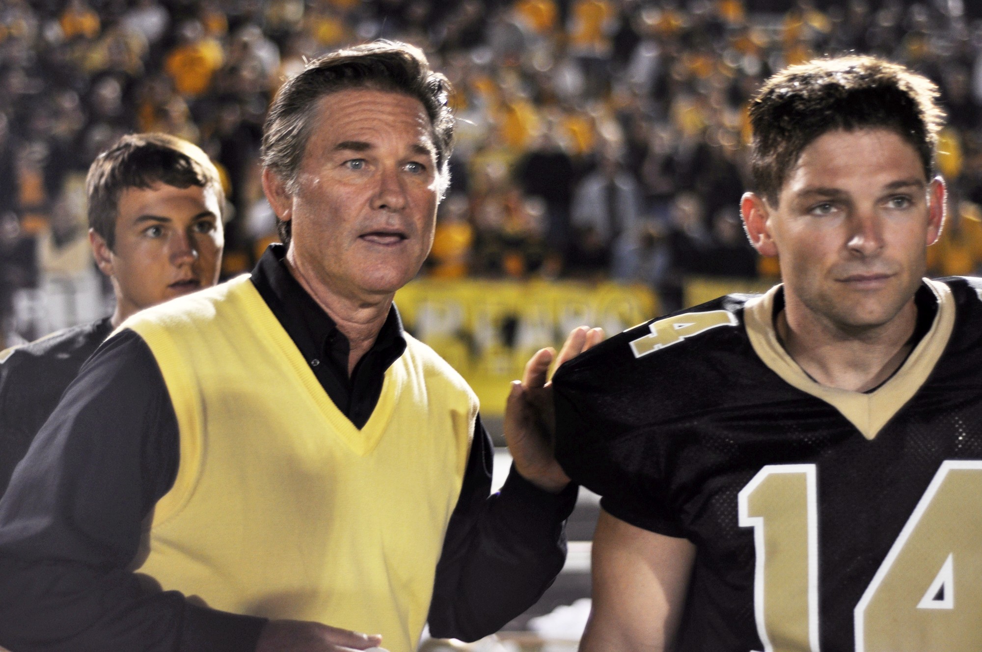 Kurt Russell stars as Coach Hand and Brian Presley stars as Scott Murphy in Anchor Bay Films' Touchback (2012)