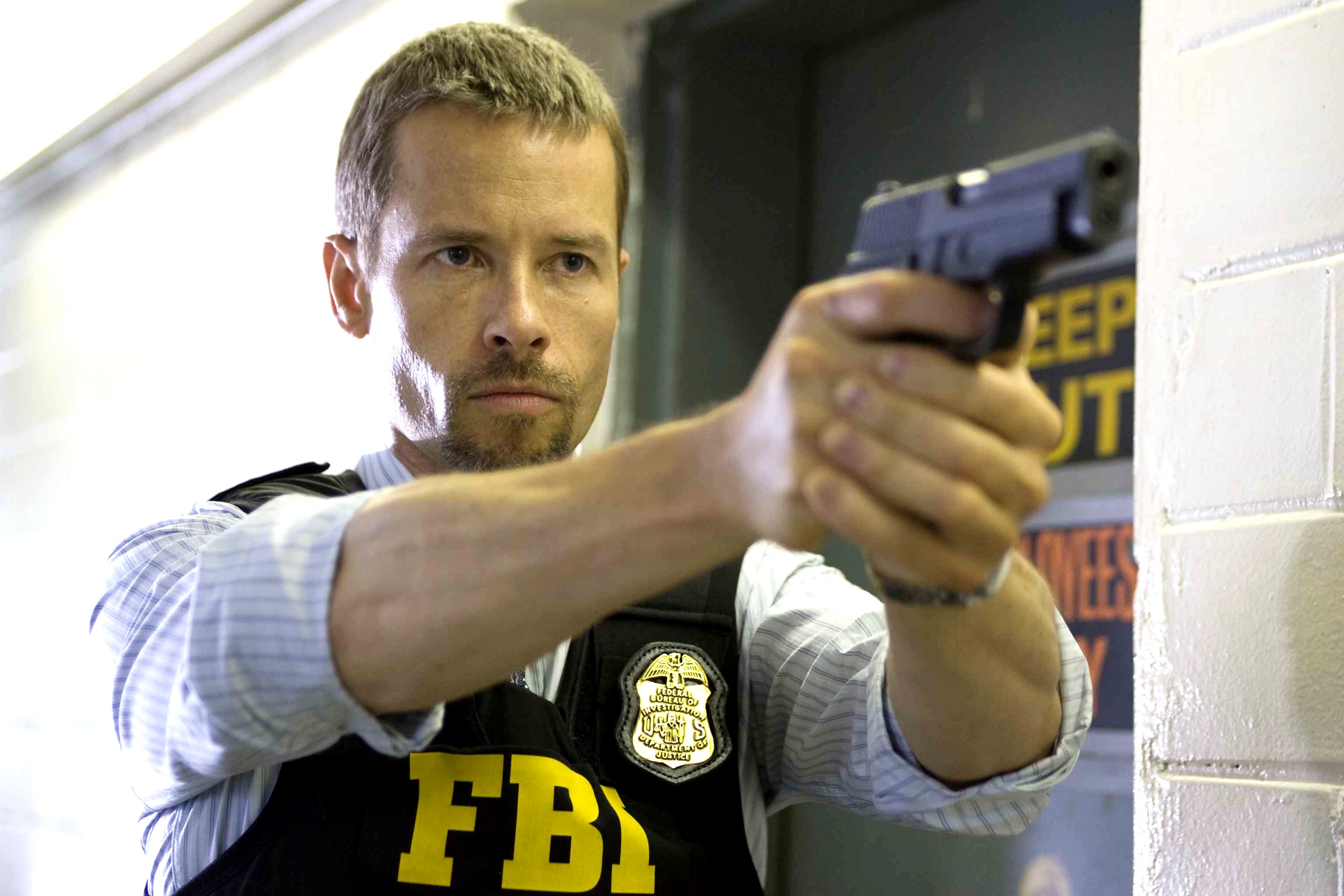 Guy Pearce stars as Roy Clayton in Overture Films' Traitor (2008). Photo credit by Rafy.