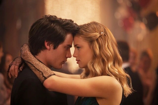 Dominic Sherwood stars as Christian Ozera and Lucy Fry stars as Lissa Dragomir in The Weinstein Company's Vampire Academy (2014). Photo credit by Laurie Sparham.