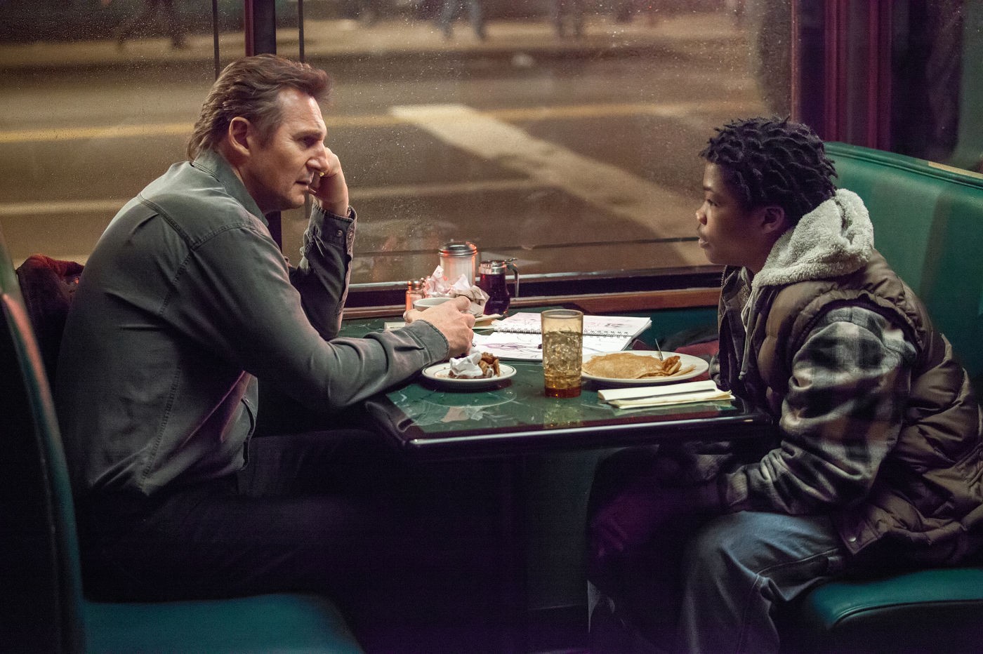 Liam Neeson stars as Matt Scudder and Astro stars as TJ in Universal Pictures' A Walk Among the Tombstones (2014)