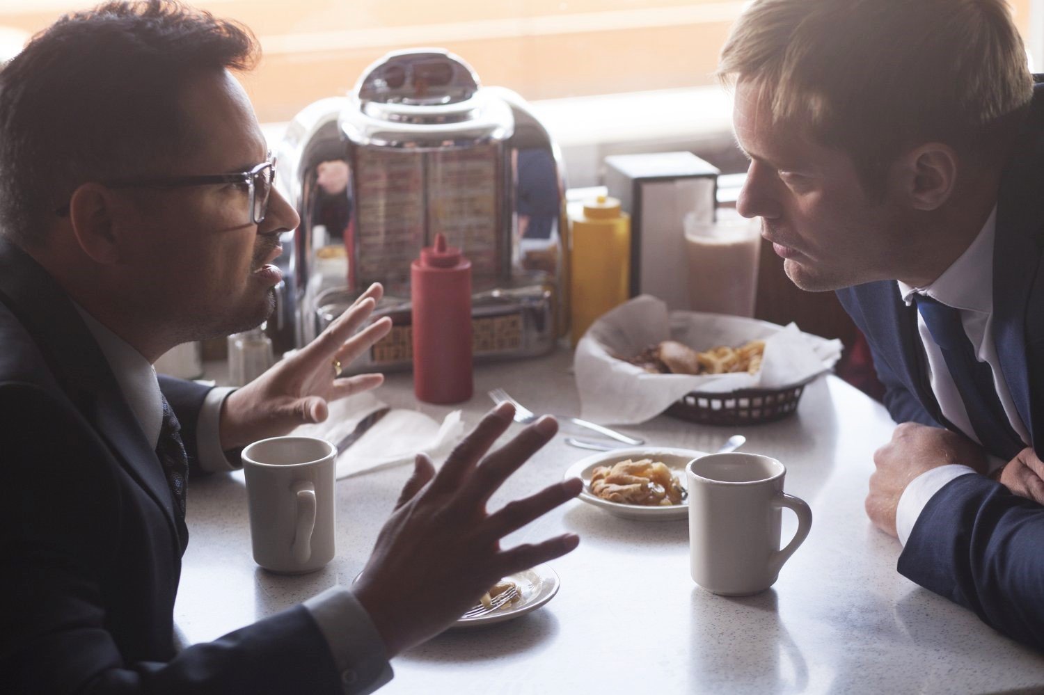 Michael Pena stars as Bob Bolano and Alexander Skarsgard stars as Terry Monroe in Saban Films' War on Everyone (2017)