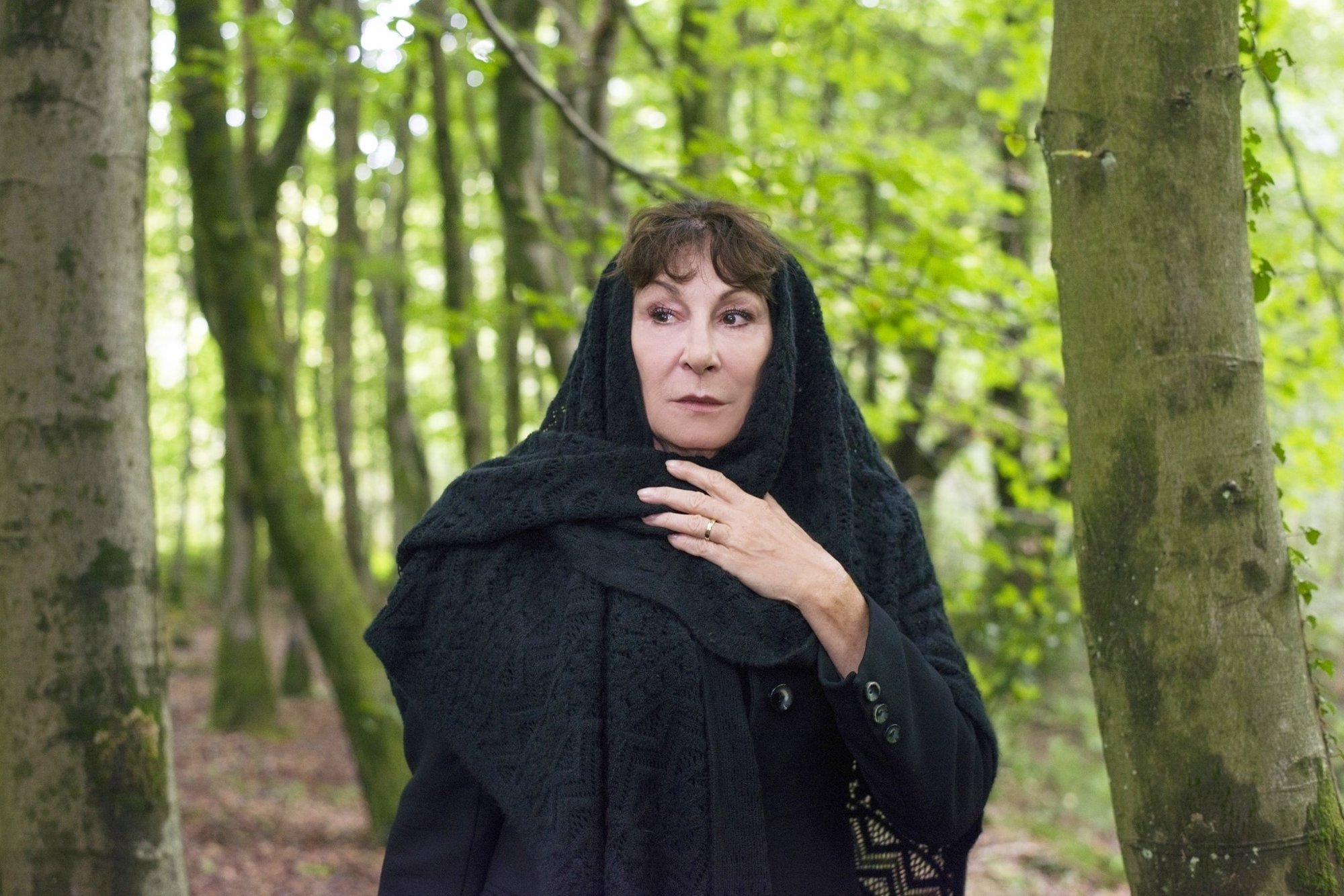 Anjelica Huston stars as Mrs. Aylwood in Lifetime's The Watcher in the Woods (2017)