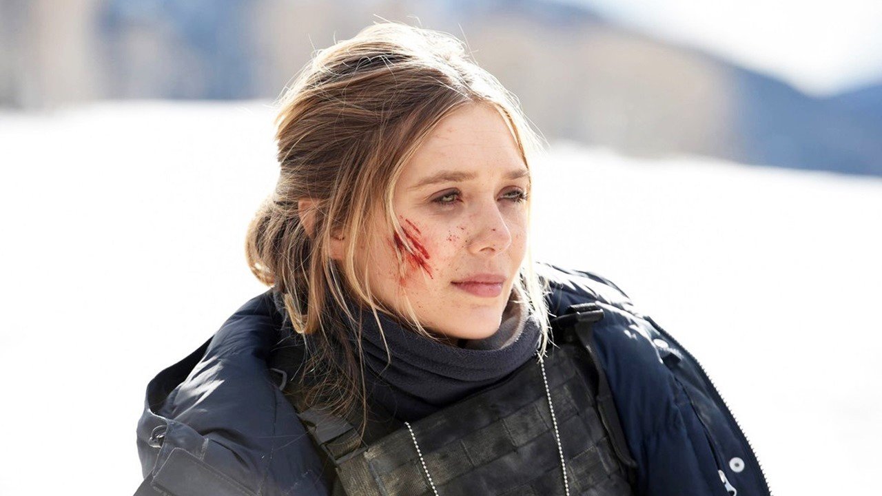 Elizabeth Olsen stars as Jane Banner in The Weinstein Company's Wind River (2017)