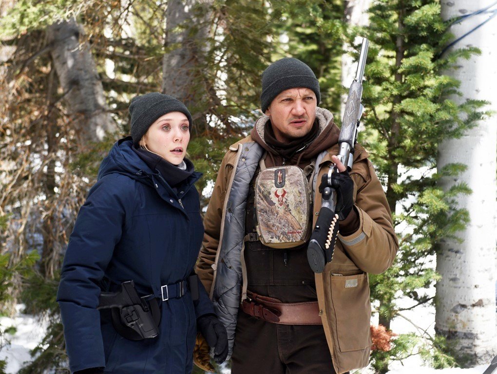Elizabeth Olsen stars as Jane Banner and Jeremy Renner stars as Cory Lambert in The Weinstein Company's Wind River (2017)