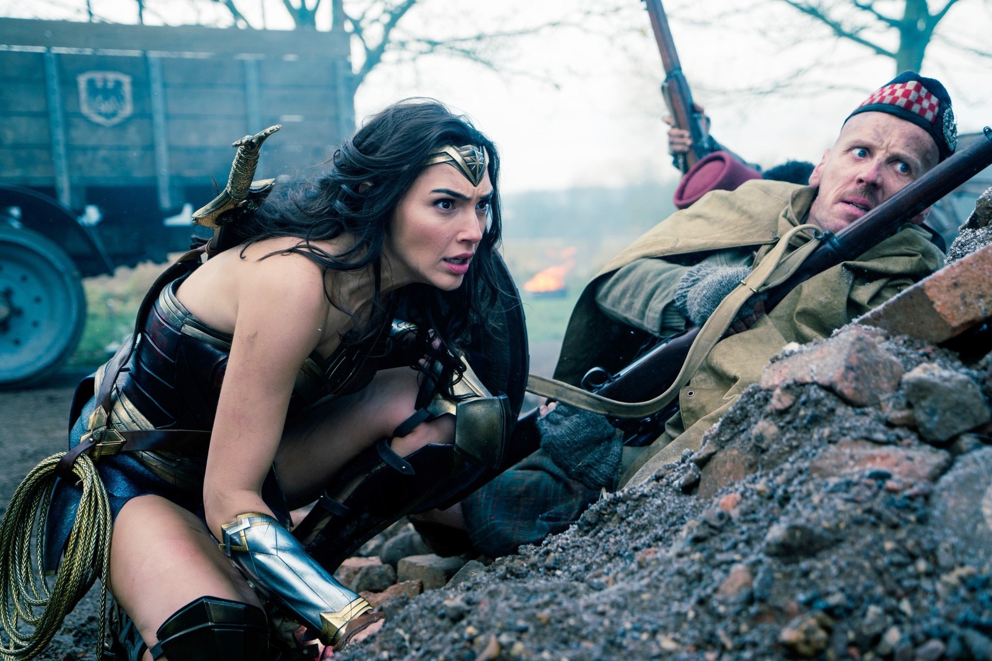 Gal Gadot stars as Diana Prince/Wonder Woman and Ewen Bremner stars as Charlie in Warner Bros. Pictures' Wonder Woman (2017)