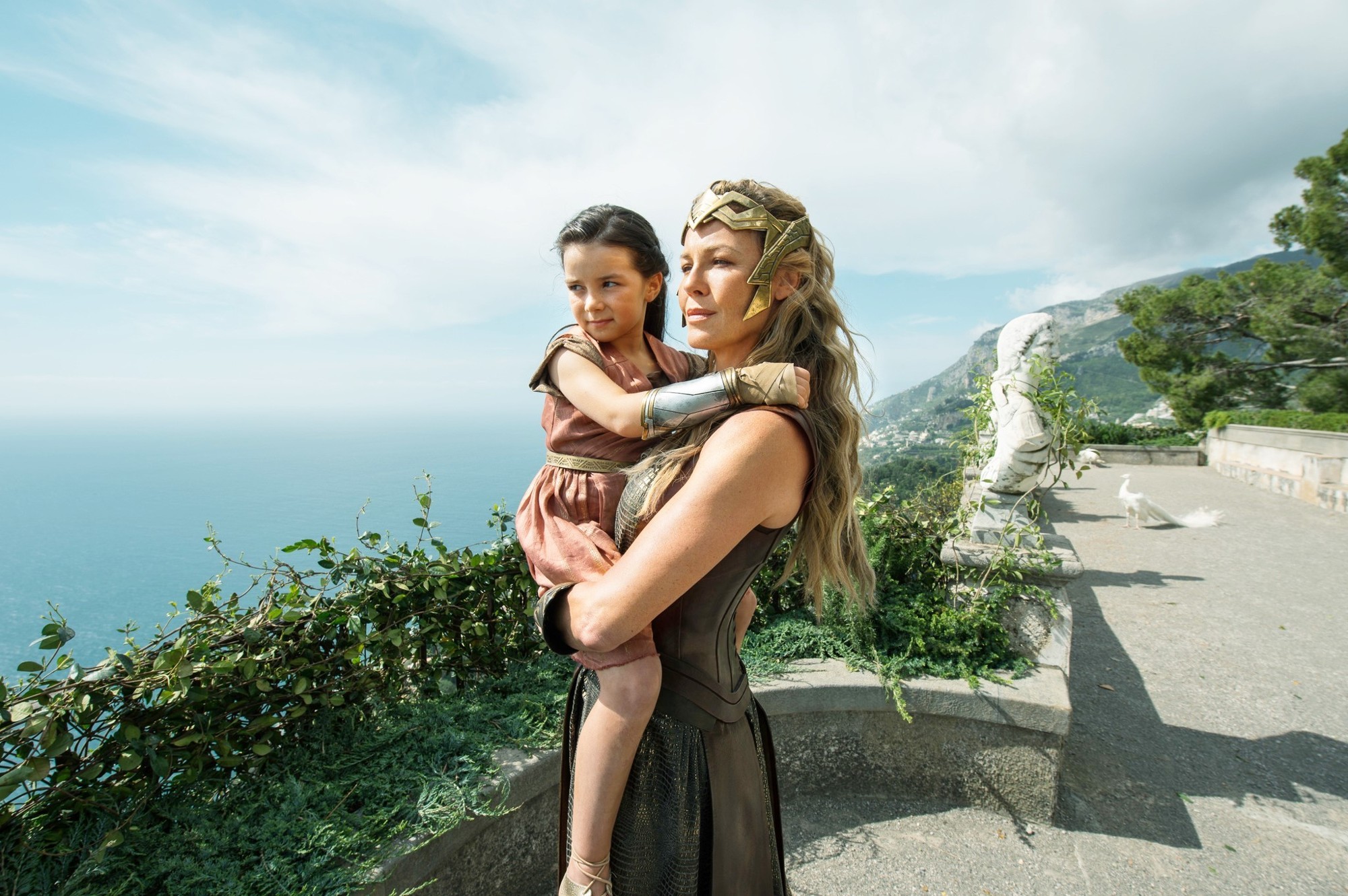 Lilly Aspell stars as Young Diana and Connie Nielsen stars as Queen Hippolyta in Warner Bros. Pictures' Wonder Woman (2017)