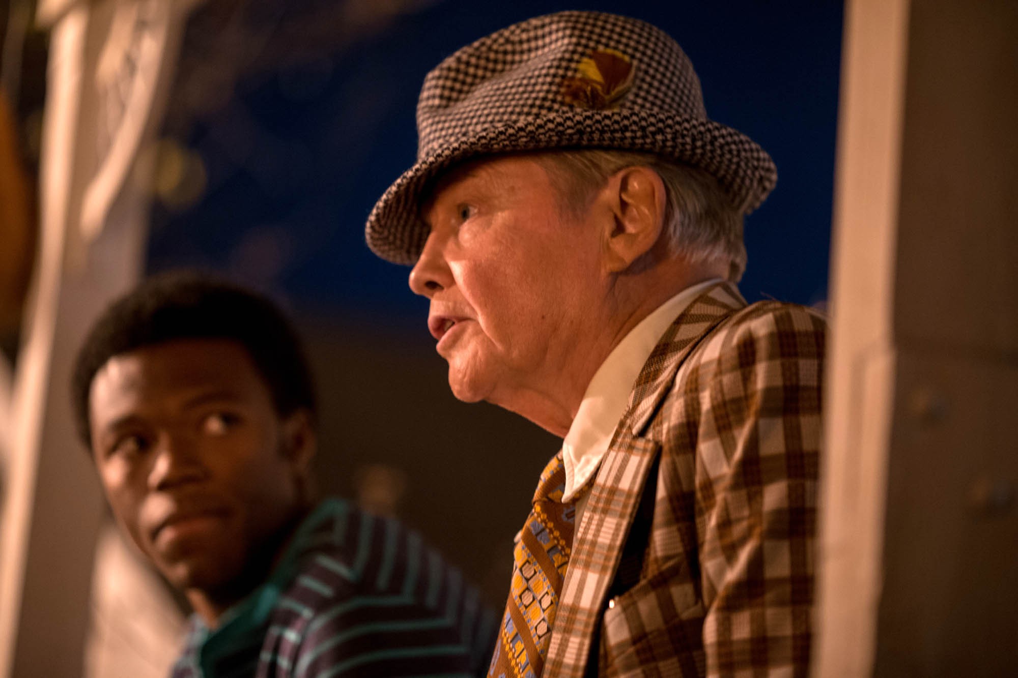 Caleb Castille stars as Tony Nathan and Jon Voight stars as Paul Bryant in Pure Flix Entertainment's Woodlawn (2015)