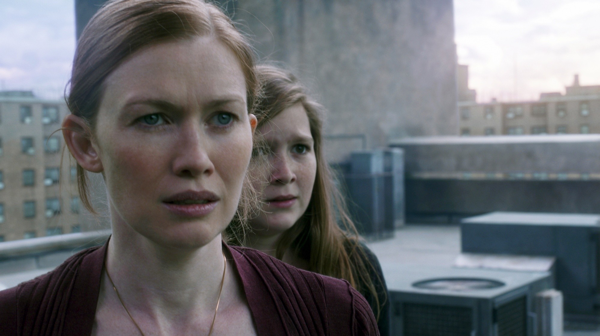 Mireille Enos stars as Karen Lane and Abigail Hargrove stars as Rachel Lane in Paramount Pictures' World War Z (2013)