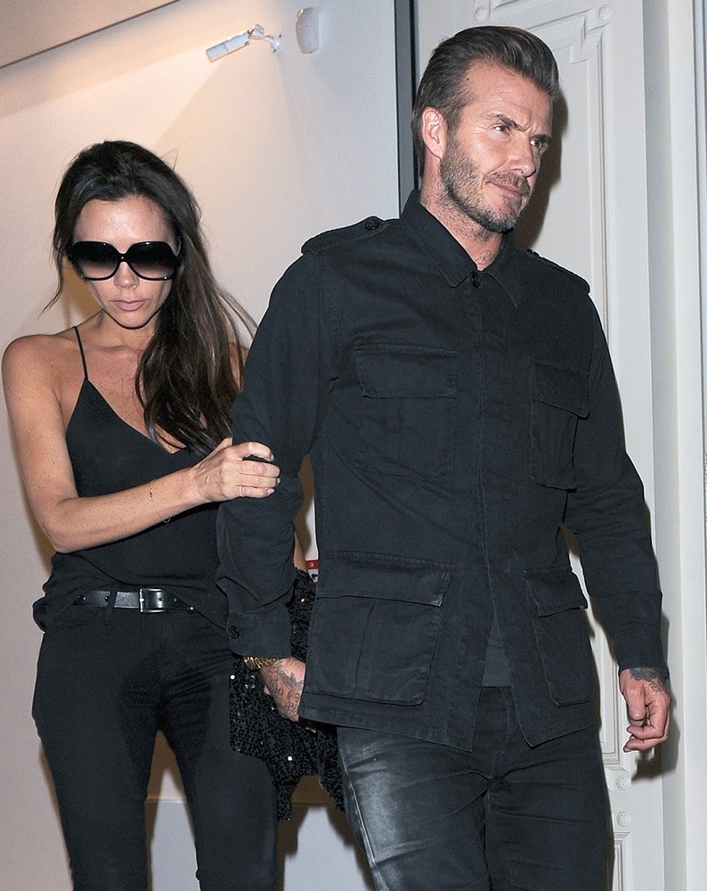 Victoria Beckham Led Out of Her Own Shop by David Beckham