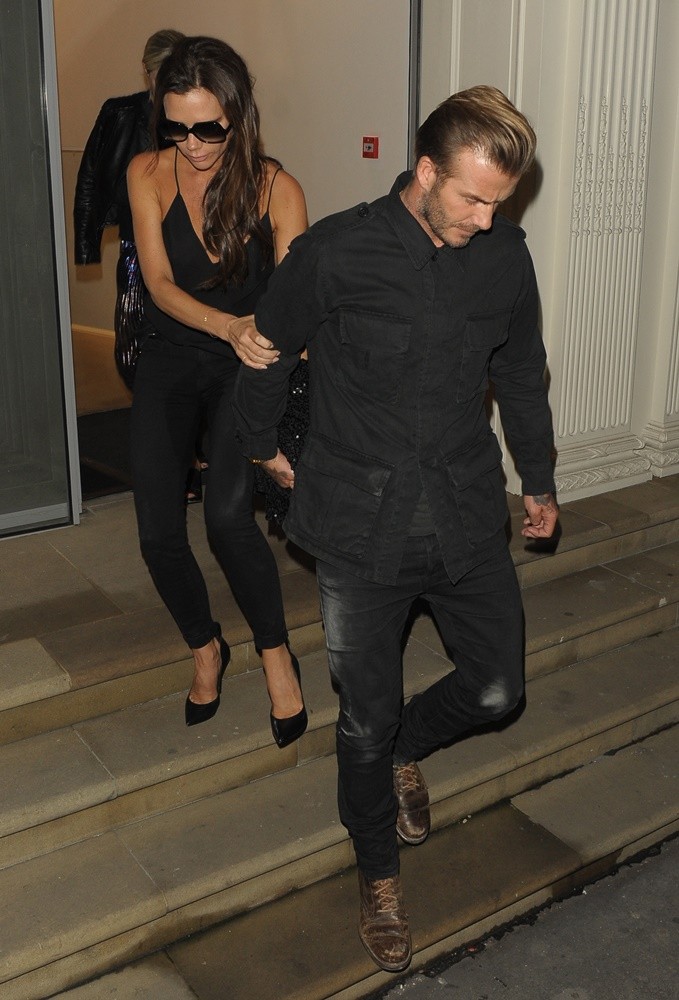 Victoria Beckham Led Out of Her Own Shop by David Beckham