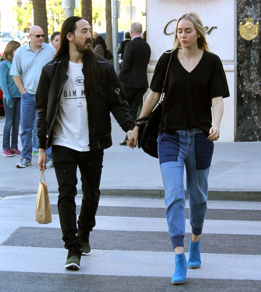 Steve Aoki and Tiernan Cowling Cross A Street in Beverly Hills