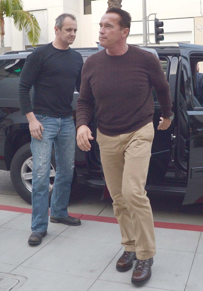 Arnold Schwarzenegger Heads to Prada on Christmas Eve
