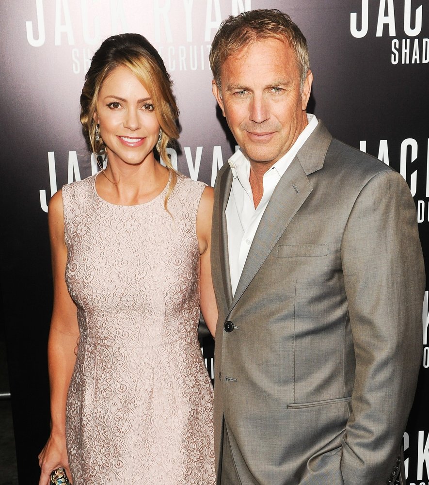 Christine Baumgartner;Kevin Costner;<br>Los Angeles Premiere of Jack Ryan: Shadow Recruit - Red Carpet Arrivals