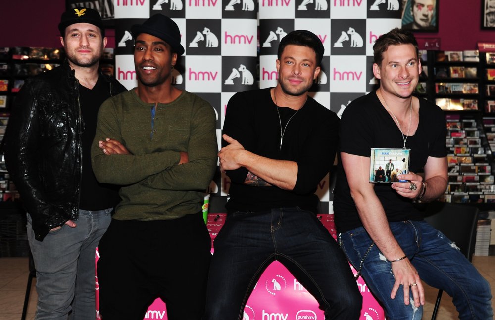Blue Sign Copies of Their Album Colours
