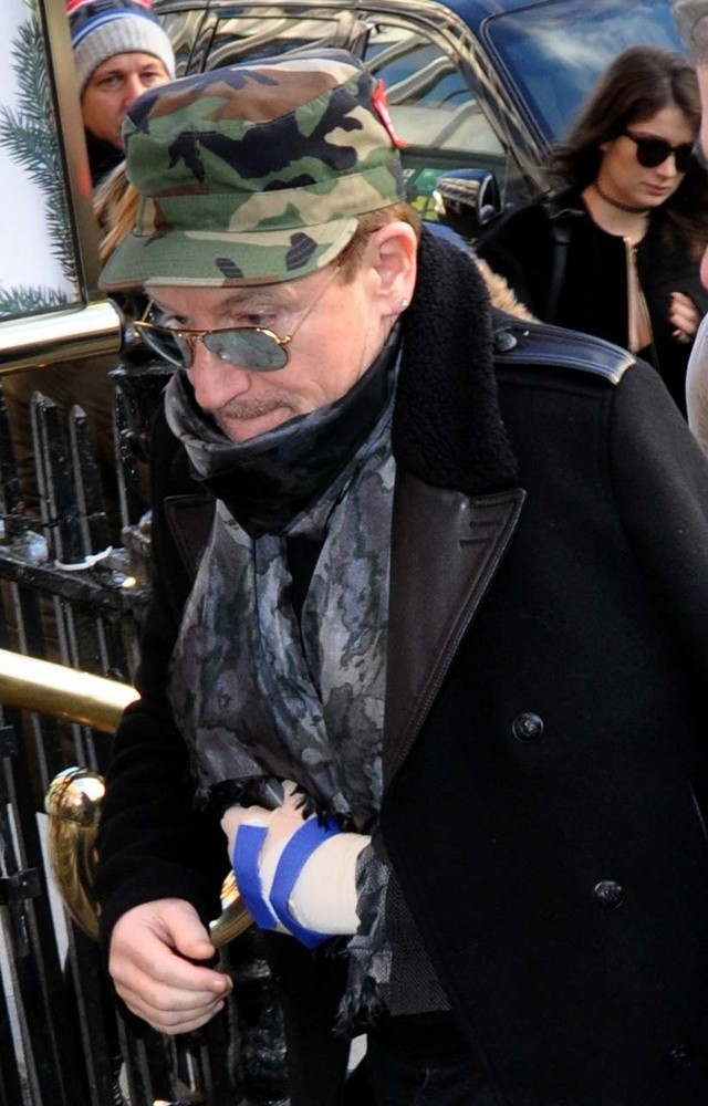 Bono Arriving at The Cliff Townhouse Restaurant