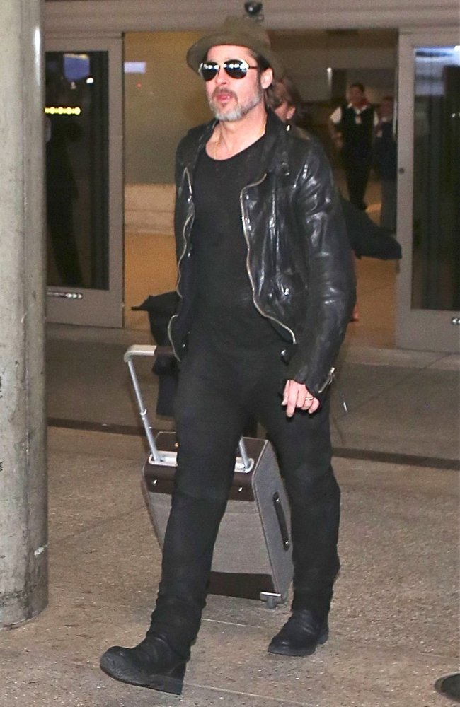 Brad Pitt Arrives at Los Angeles International Airport