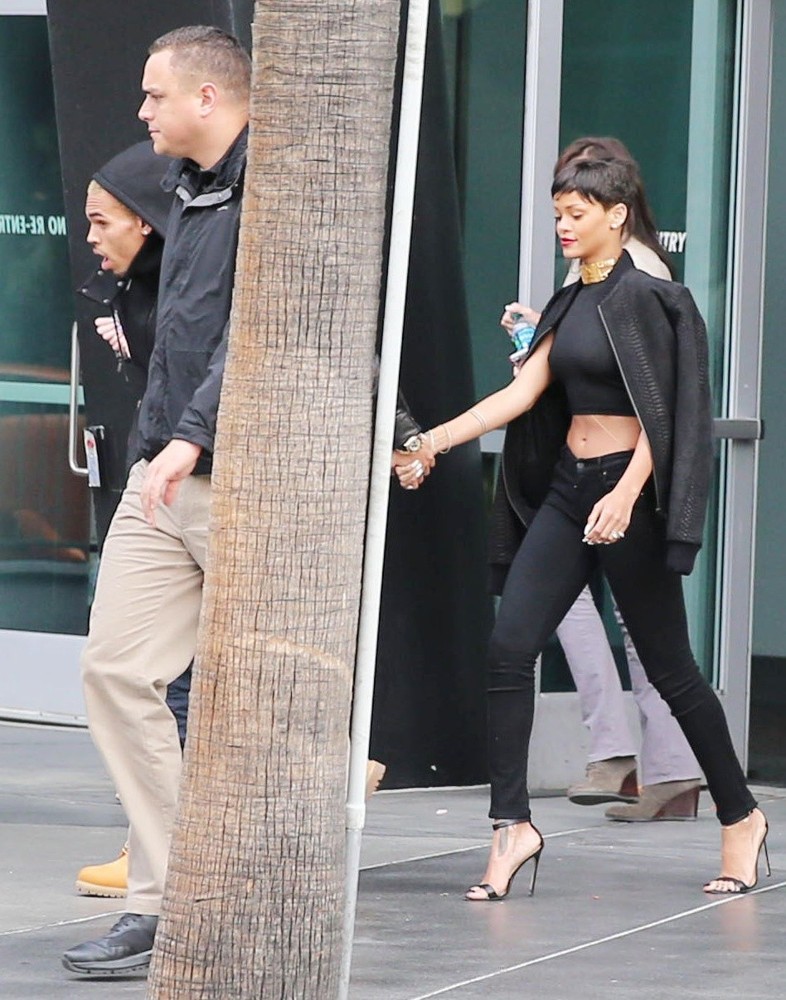 Rihanna and Chris Brown Leaving The Staples Center in Downtown LA Holding Hands
