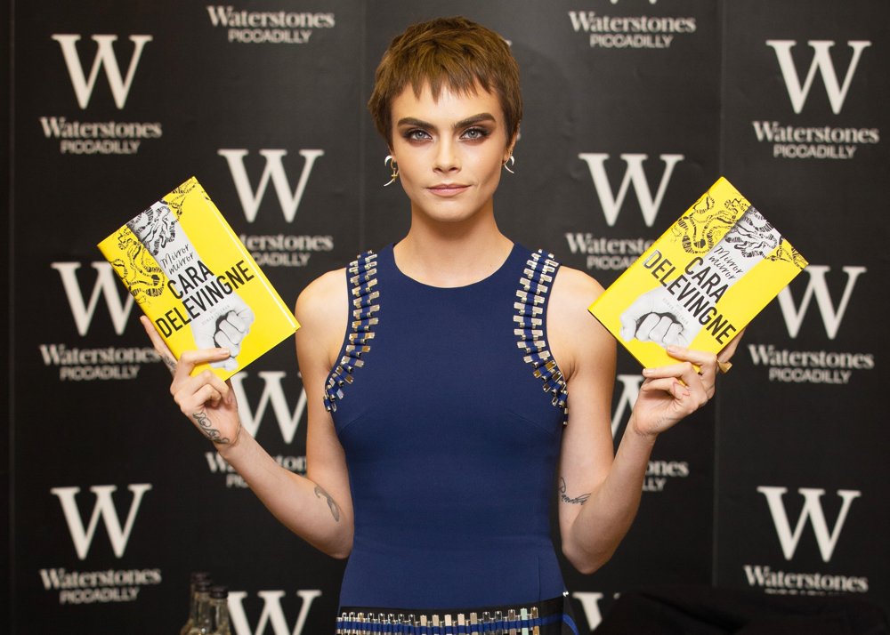 Cara Delevingne Signs Copies of Her Debut Novel Mirror Mirror