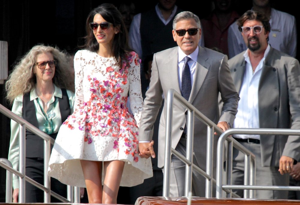 Amal Alamuddin;George Clooney;<br>George Clooney and Amal Alamuddin Leave The Aman Canal Grande Hotel