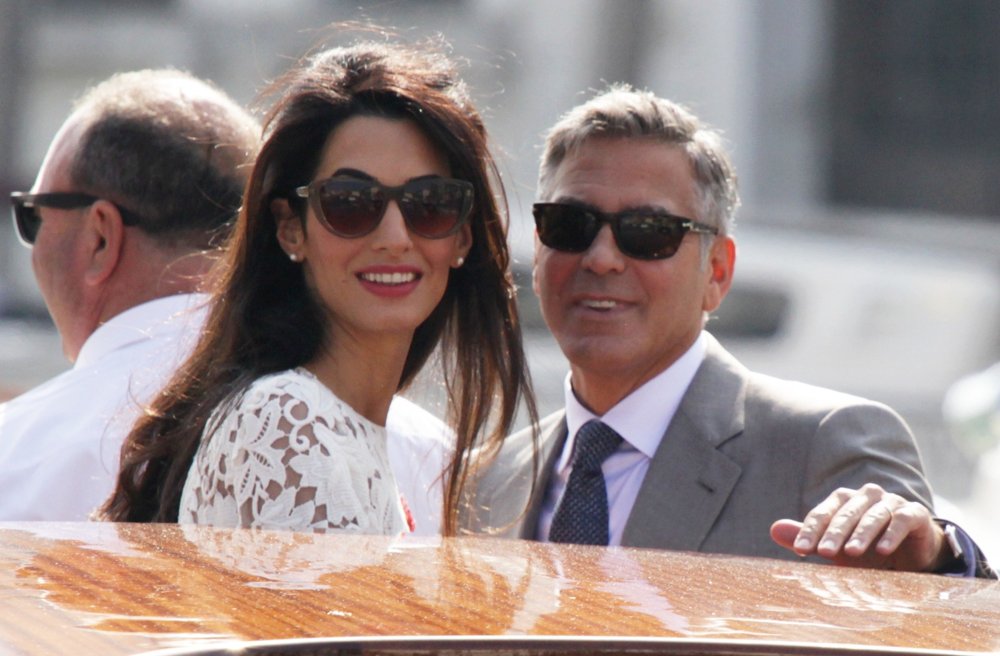 Amal Alamuddin;George Clooney;<br>George Clooney and Amal Alamuddin Leave The Aman Canal Grande Hotel