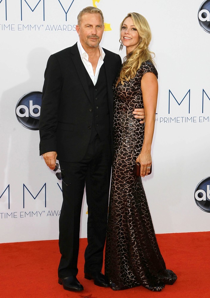 Kevin Costner;Christine Baumgartner;<br>64th Annual Primetime Emmy Awards - Arrivals