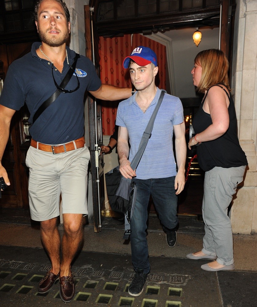 Daniel Radcliffe Is Ushered Out of The Noel Coward Theatre