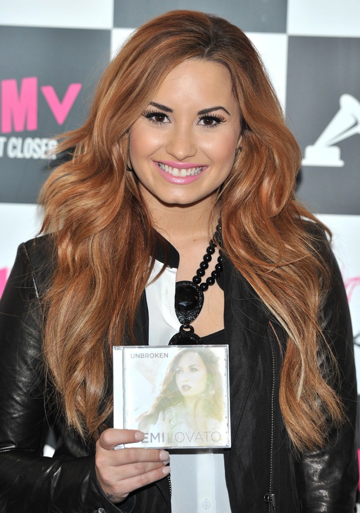 Demi Lovato;<br>Demi Lovato Signs Copies of Her Album Unbroken