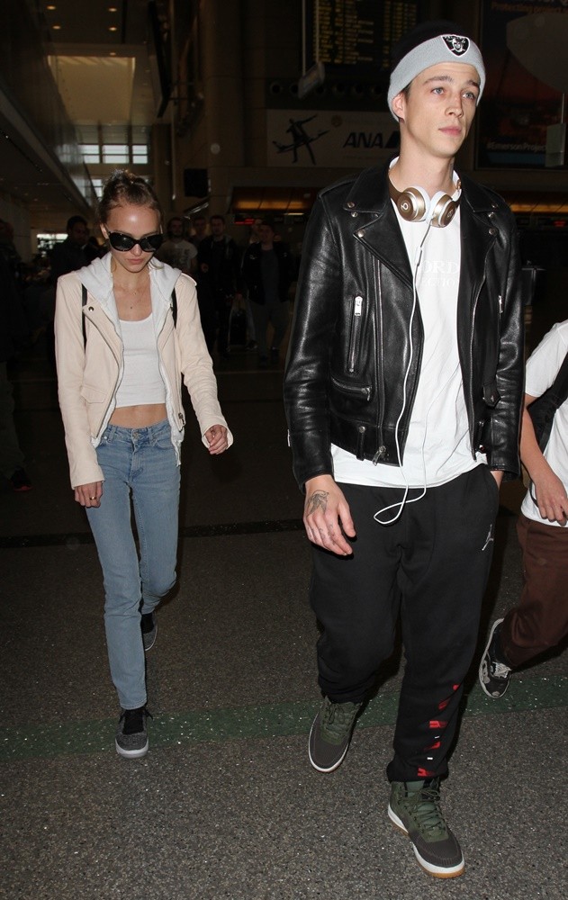 Lily-Rose Depp and Ash Stymest Arrive at Los Angeles International Airport