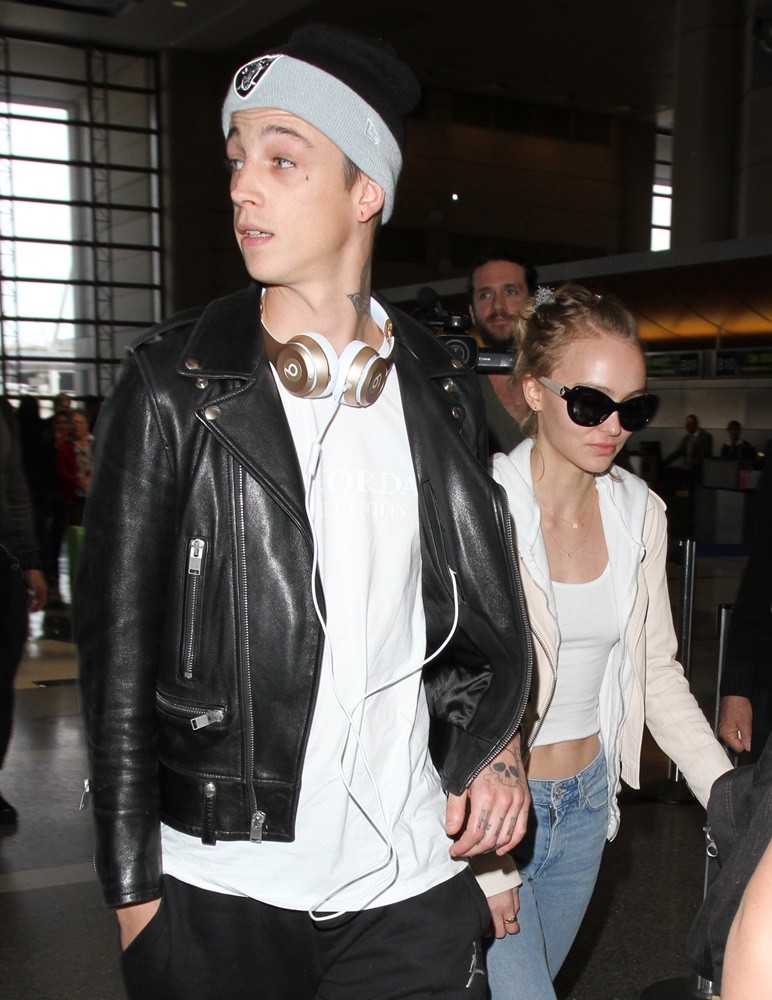 Lily-Rose Depp and Ash Stymest Arrive at Los Angeles International Airport