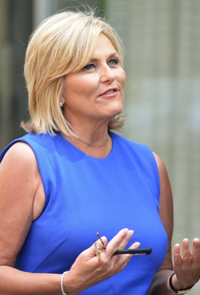 Diane Sawyer Conducts An Interview While Out Walking