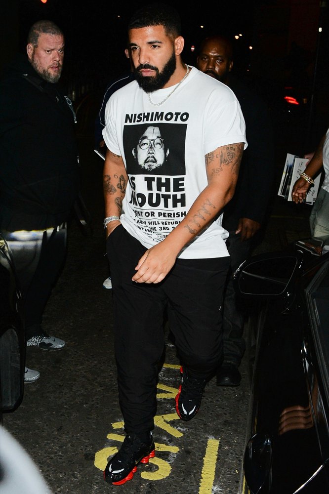 Drake Seen Leaving Playboy Club