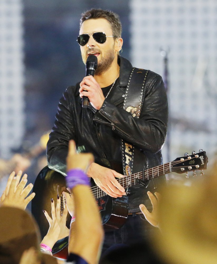 Eric Church;<br>Eric Church Performs During Half-Time of A NFL Football Game Between The Cowboys and Redskins