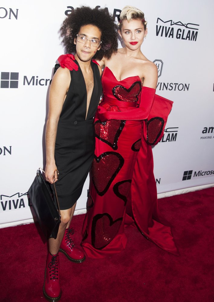 Tyler Ford;Miley Cyrus;<br>2015 amfAR Inspiration Gala New York - Arrivals