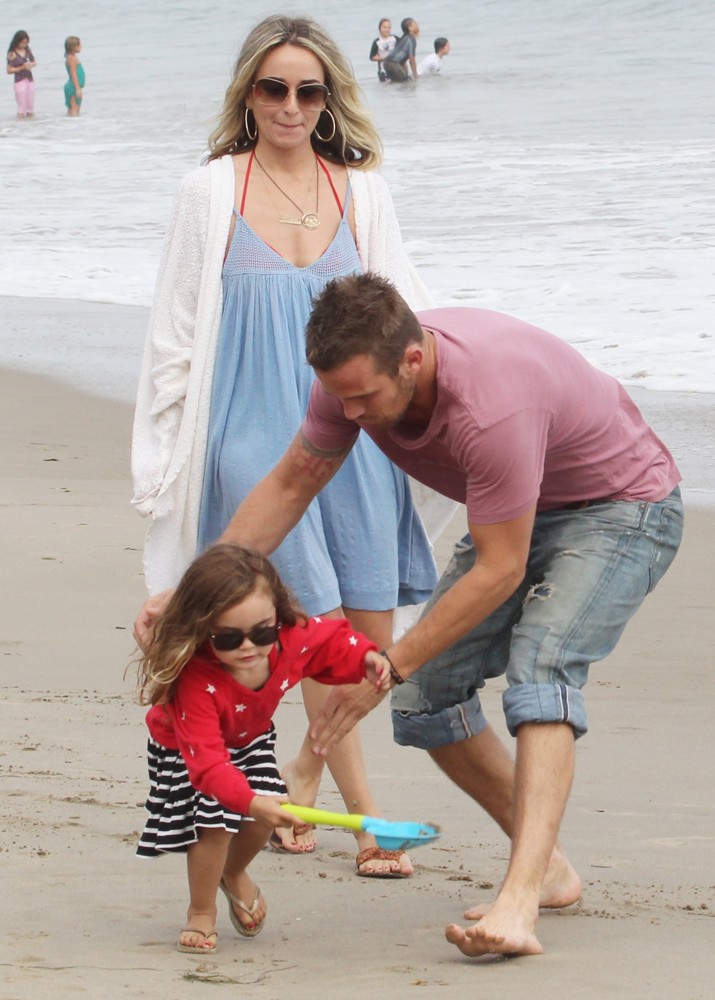 Everleigh Ray Gigandet;Dominique Geisendorff;Cam Gigandet;<br>Cam Gigandet and Dominique Geisendorff Walk with Everleigh Ray Gigandet on The Beach