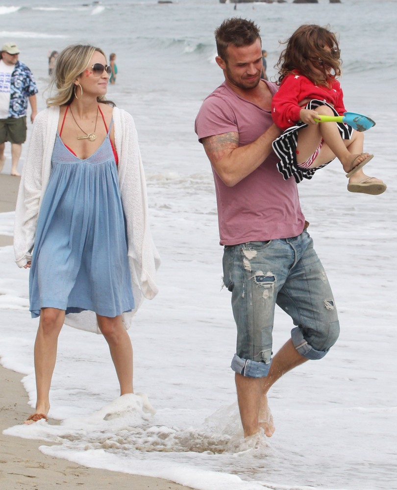 Dominique Geisendorff;Cam Gigandet;Everleigh Ray Gigandet;<br>Cam Gigandet and Dominique Geisendorff Walk with Everleigh Ray Gigandet on The Beach