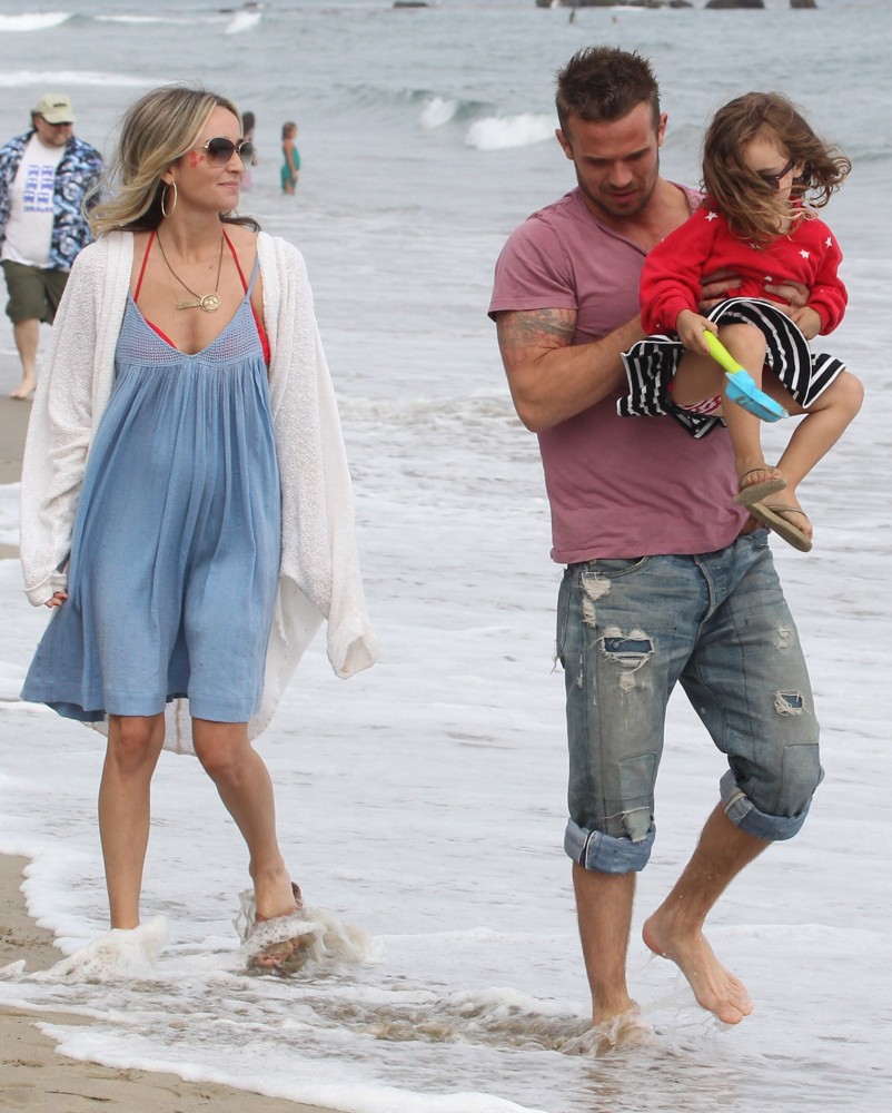 Dominique Geisendorff;Cam Gigandet;Everleigh Ray Gigandet;<br>Cam Gigandet and Dominique Geisendorff Walk with Everleigh Ray Gigandet on The Beach