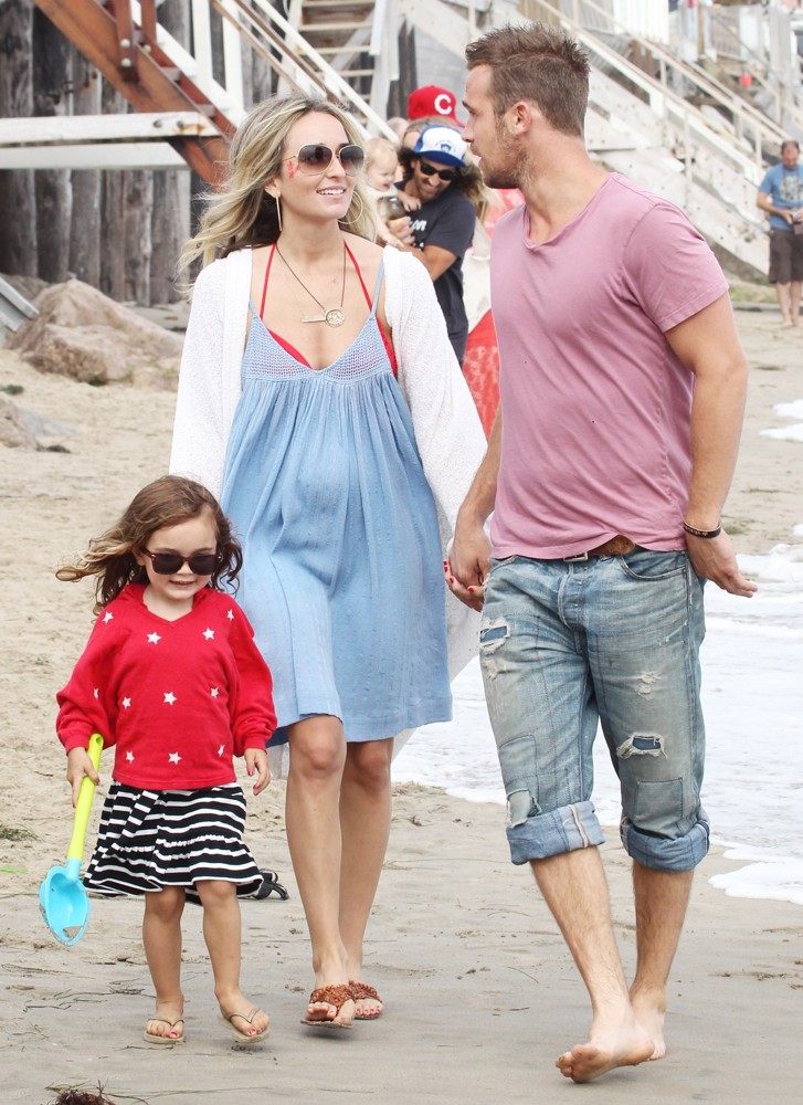 Everleigh Ray Gigandet;Dominique Geisendorff;Cam Gigandet;<br>Cam Gigandet and Dominique Geisendorff Walk with Everleigh Ray Gigandet on The Beach