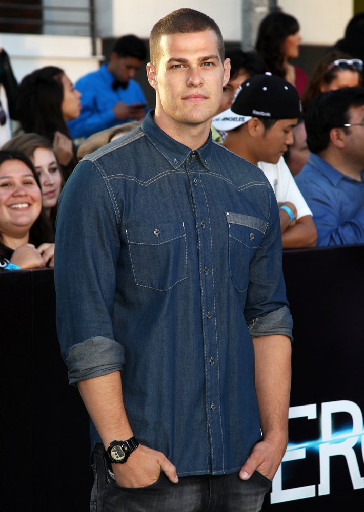 Greg Finley;<br>Premiere of Summit Entertainment's Divergent - Red Carpet Arrivals