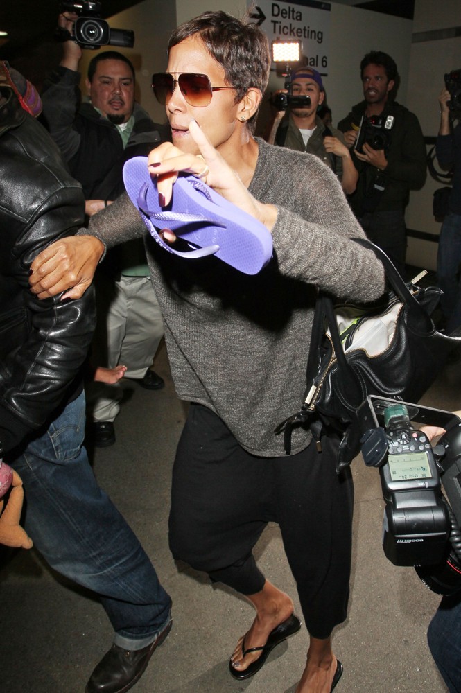 Halle Berry;<br>Halle Berry Arrives at LAX Airport with Olivier Martinez and Nahla Aubry