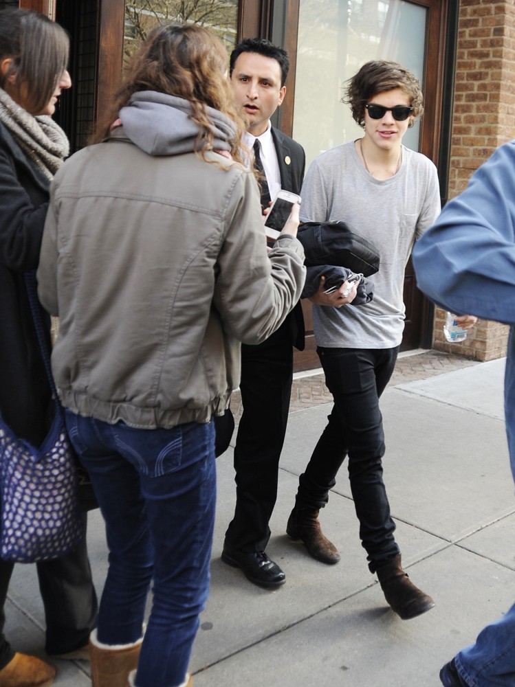 Harry Styles;One Direction;<br>Harry Styles Carrying A Toiletry Bag, Is Seen Leaving The Hotel That He and Taylor Swift Arrived