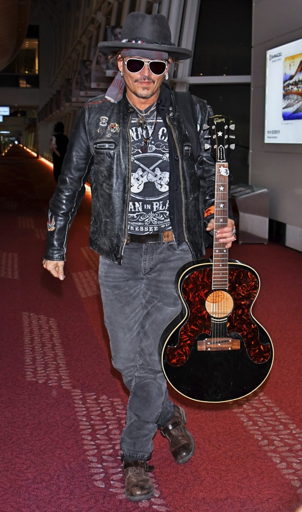 Johnny Depp Arrives at Tokyo International Airport