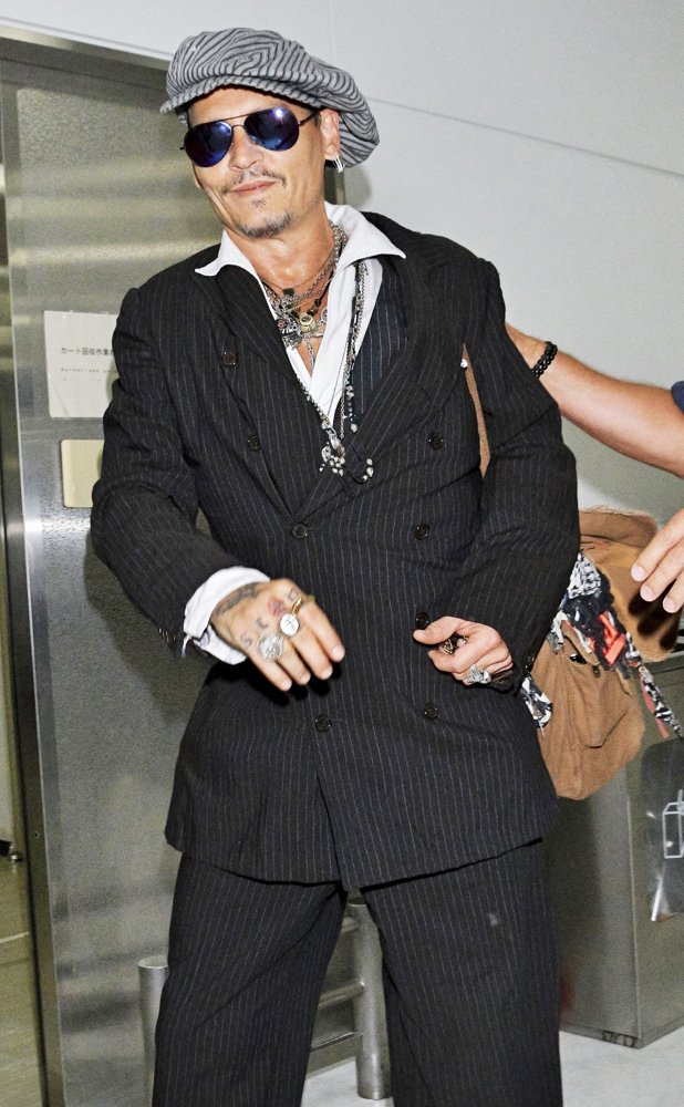 Johnny Depp<br>Johnny Depp at Narita International Airport in Tokyo