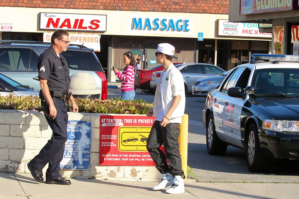Justin Bieber;<br>Justin Bieber Is Asked by A Los Angeles Police Officer to Move His Fisker Karma