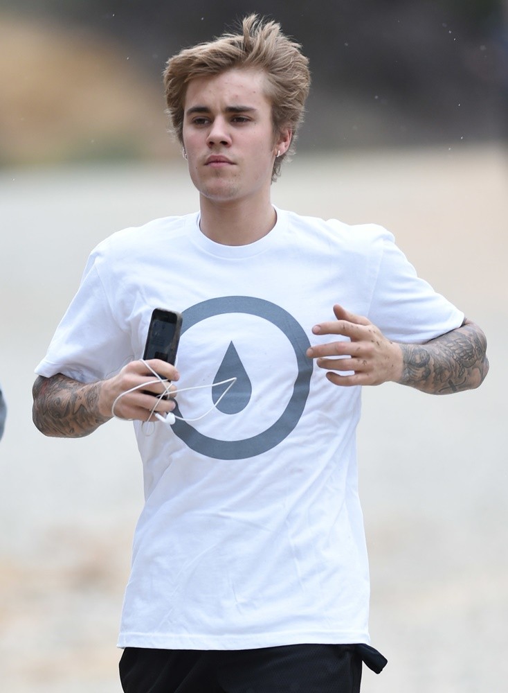 Justin Bieber Takes A Run on A Rainy Windy Day
