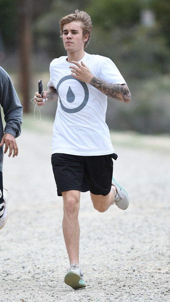 Justin Bieber Takes A Run on A Rainy Windy Day