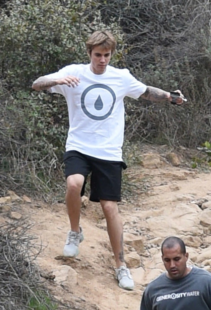 Justin Bieber Slips on A Steep Trail and Gets Right Back Up
