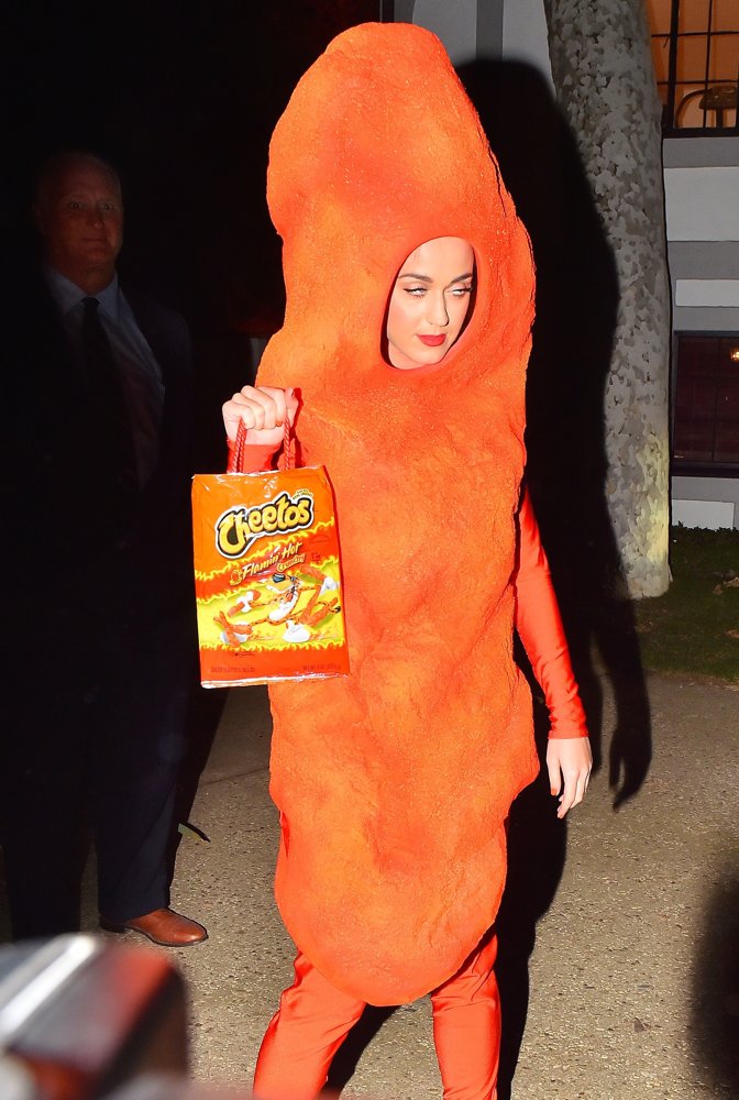 Katy Perry;<br>Katy Perry Poses in A Cheeto Costume
