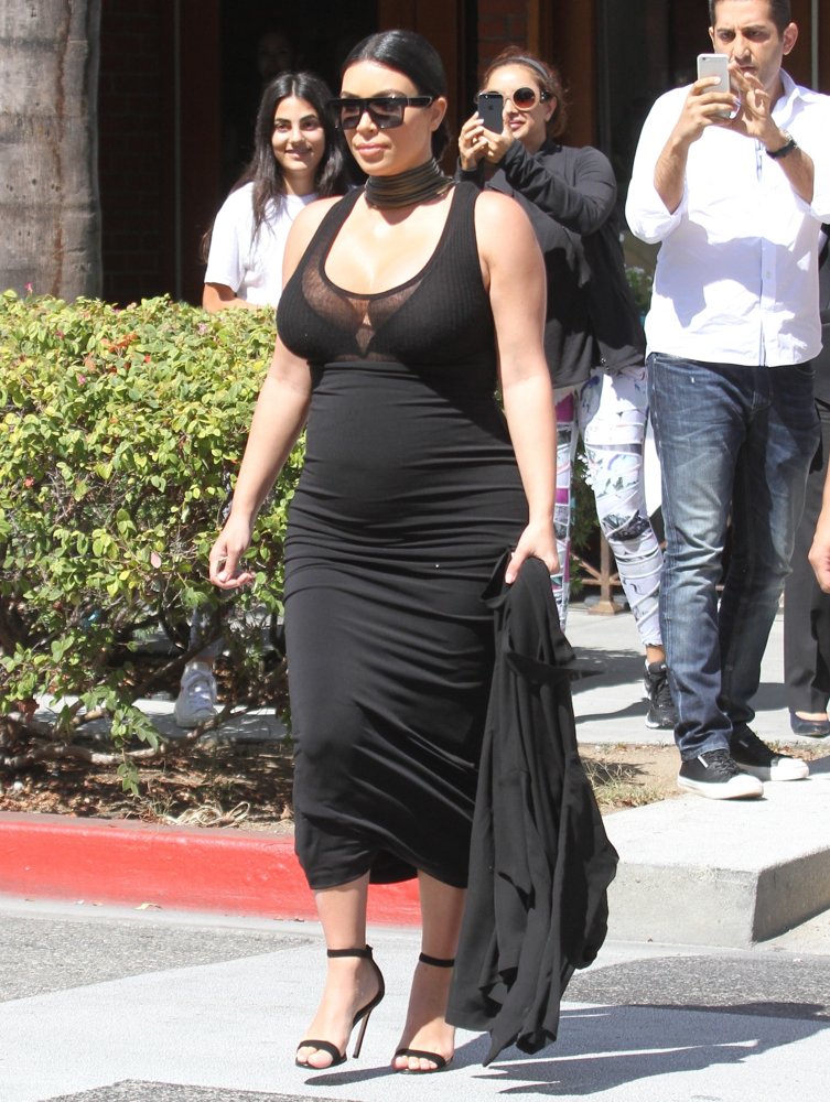 Kim Kardashian Stays Chic in A Black Dress