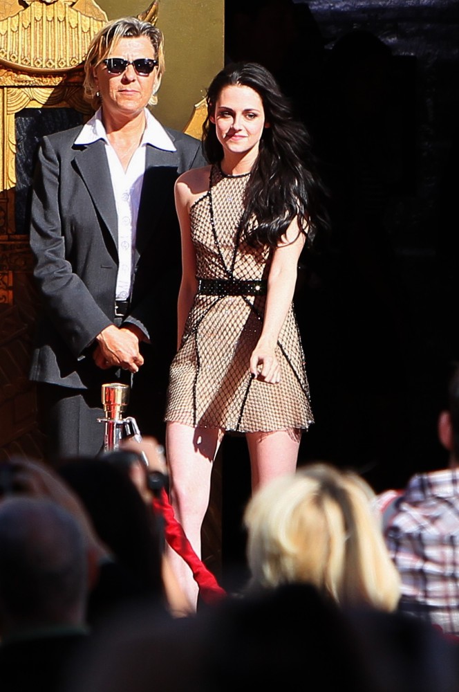 Kristen Stewart;<br>Stars of The Twilight Saga Films Are Honoured with A Hand and Footprint Ceremony